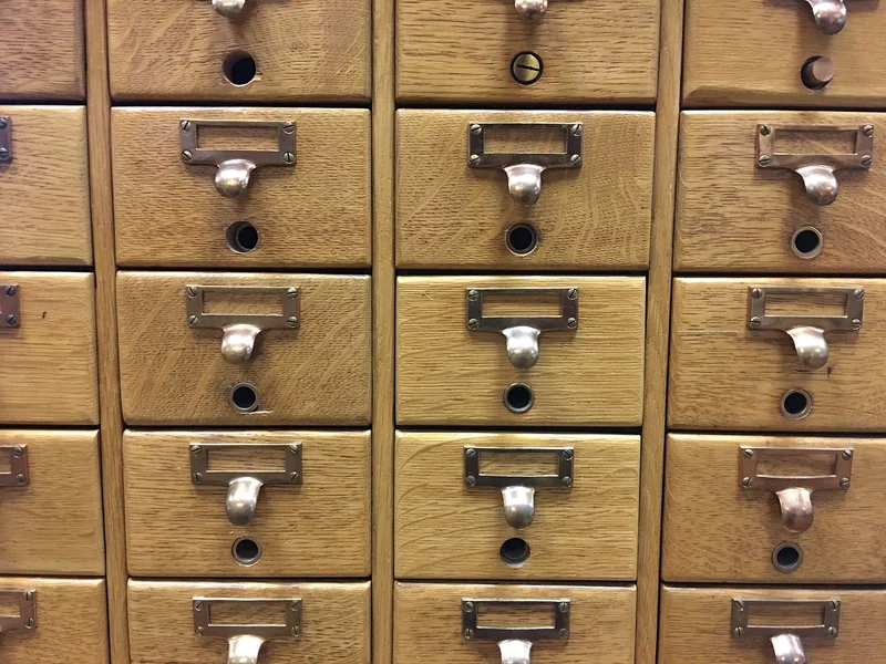 A wooden library card catalogue